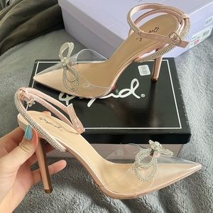 Quipid Heels brand new in box size 10